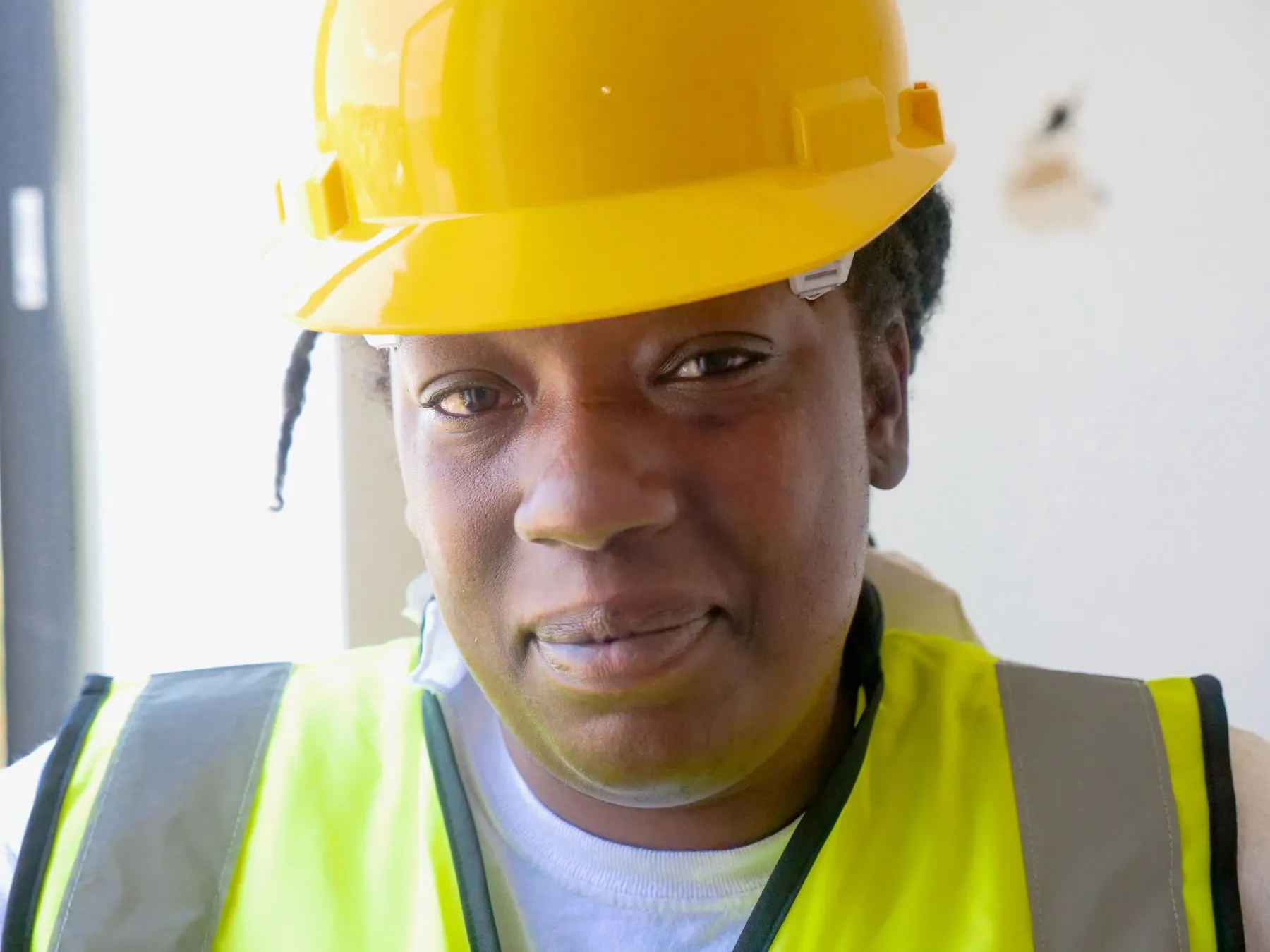 A female engineer reviewing work on site